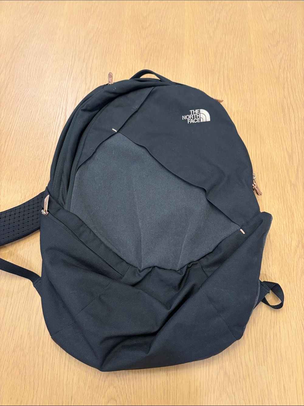 The North Face Black Backpack with Rose Gold Accents